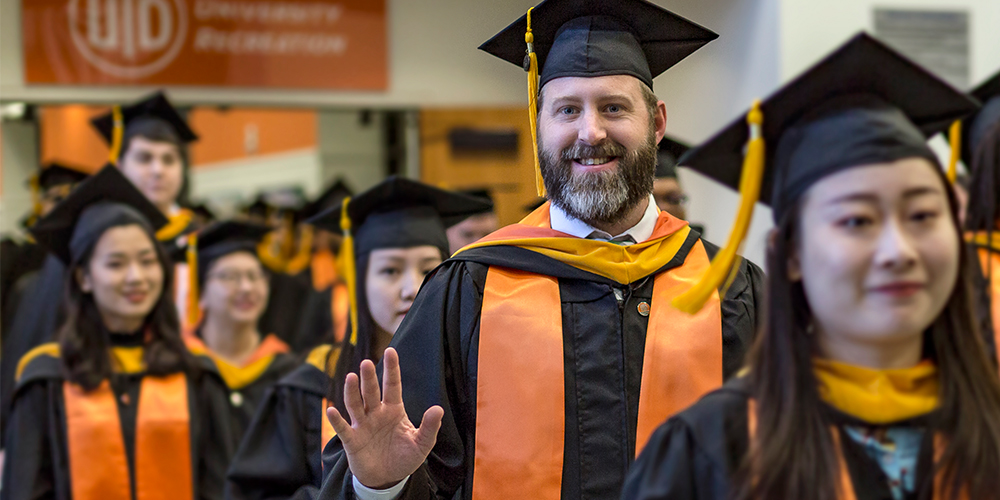 David Dowdle smiles as he processes to the graduation ceremony